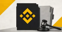 Official yellow Binance diamond logo on a large black legal-document plaque beside a greyscale court filing folder and gavel on an off-white and yellow editorial background.