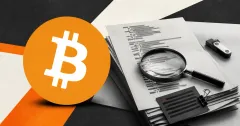 Large official orange Bitcoin logo beside a greyscale unbranded cybersecurity audit dossier with redacted code-review pages, a magnifying glass and a hardware security key on charcoal and off-white editorial panels.