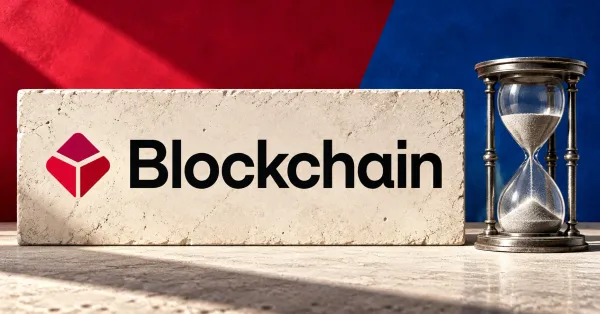 One large official red Blockchain cube and black Blockchain wordmark on an ivory stone sign beside a smaller unbranded greyscale hourglass, against crimson and cobalt panels.