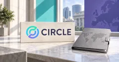 One large official gradient Circle emblem and navy CIRCLE wordmark on an off-white stone sign beside an unbranded greyscale world-map reserve ledger with a metal clasp, against turquoise and violet panels and a blurred institutional skyline.