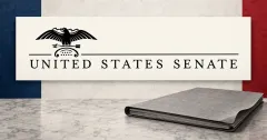 Prominent official black United States Senate eagle-and-wordmark on an ivory plaque beside an unbranded greyscale legislative folder, with navy and crimson background panels.