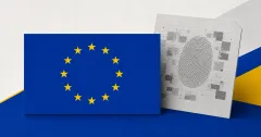 Official European Union flag with twelve gold stars on a prominent blue plaque beside a greyscale provenance document with a fingerprint, set against blue and gold editorial panels.