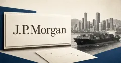 Large official J.P. Morgan wordmark on a payment plaque beside a greyscale cargo ship and Seoul skyline, illustrating Kinexys cross-border trade payments.