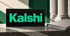 Large official green Kalshi wordmark on a black plaque beside an unbranded greyscale court document folder on a stone desk, with courthouse columns behind.