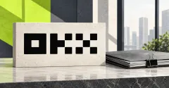 Large official black OKX block-letter wordmark on an upright off-white stone sign beside an unbranded greyscale investment folio, blank papers and binder clip, with lime and slate panels and an institutional window backdrop.
