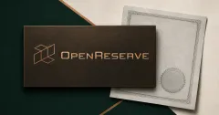 Large official OpenReserve copper wordmark and geometric mark on a dark bronze plate beside an unbranded greyscale bank charter document with a blank embossed seal.
