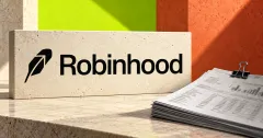 Large official black Robinhood feather and wordmark on an ivory stone sign beside an unbranded greyscale financial document stack with a binder clip, against lime green and vermilion panels.