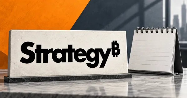 Large official black Strategy wordmark with its integral raised B symbol on an off-white stone desk sign beside an unbranded greyscale blank calendar, against orange and slate panels.