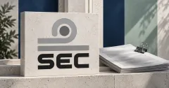 One large official grey and black SEC Thailand emblem and SEC lettering on an off-white stone sign beside an unbranded greyscale fund document with a steel binder clip, against navy and sage panels.
