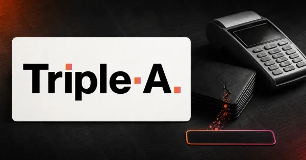 Large official Triple-A wordmark on an off-white payment card beside a greyscale payment terminal and a cracked, unbranded hot-wallet ledger.