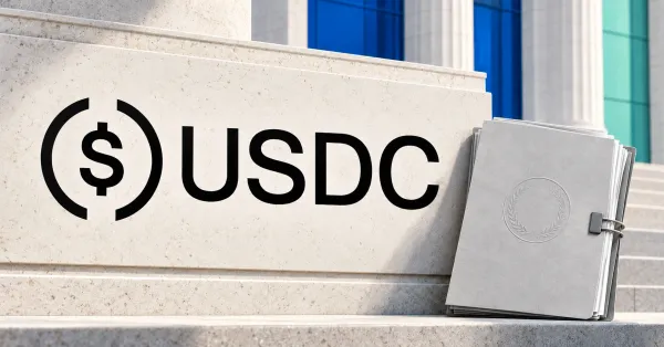 Large official black USDC emblem and USDC wordmark on an off-white stone sign beside an unbranded greyscale regulatory reserve dossier with a blank embossed seal and metal clasp, against cobalt-blue and mint panels.